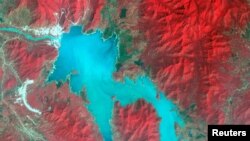 The Blue Nile River is seen as the Grand Ethiopian Renaissance Dam reservoir fills near the Ethiopia-Sudan border, in this broad spectral image taken Nov. 6, 2020. (NASA/METI/AIST/Japan Space Systems, and U.S./Japan ASTER Science Team/Handout via Reuters)