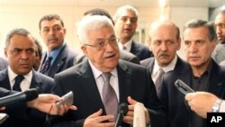 Palestinian Authority President Mahmoud Abbas speaks to the media after meeting with US Secretary of State Hillary Clinton at the State Department in Washington, D.C., 11 Jun 2010