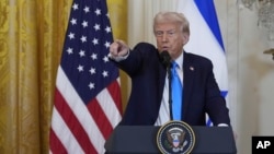 President Donald Trump and Israeli Prime Minister Benjamin Netanyahu take questions during a news conference in the East Room of the White House, Feb. 4, 2025, in Washington. 