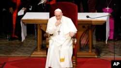 FILE - Pope Francis attends a meeting with priests, religious men and women, seminarians and catechists, at the Cathedral of Saint Martin, in Bratislava, Slovakia, Sept. 13, 2021.