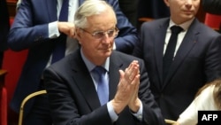 French Prime Minister Michel Barnier gestures after the result of the no-confidence vote on his administration at the National Assembly in Paris on Dec. 4, 2024.