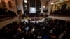 Senior Pastor of The Abyssinian Baptist Church, Reverend Dr. Kevin R. Johnson gives the benediction during a ceremony in celebration of Roberta Flack's life at The Abyssinian Baptist Church, March 10, 2025, in New York. 