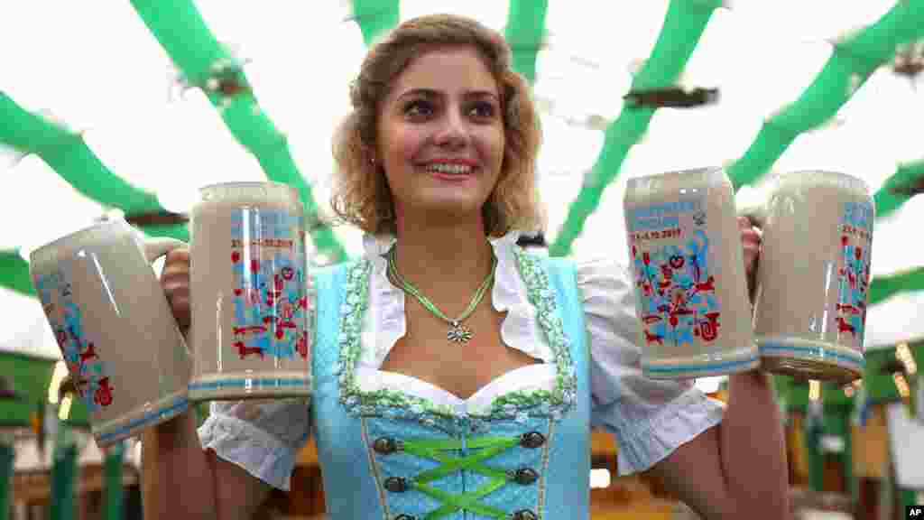 Elena poses with the new official Oktoberfest 2019 beer mugs in Munich, Germany.