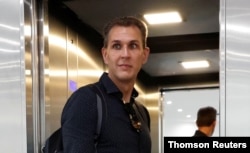 Szabolcs Dull, editor-in-chief of Hungary's main independent website Index, leaves the newsroom after being sacked in Budapest, July 22, 2020.