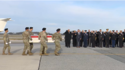President Donald Trump, top military personnel and Iowa state officials honored two members of the Iowa National Guard and a civilian interpreter killed in Syria, in a solemn dignified transfer at Dover Air Force Base in Delaware, December 17, 2025.