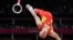 Chinese gymnast Chen Yibing performs on the rings during the Artistic Gymnastic men's team final, July 30, 2012.