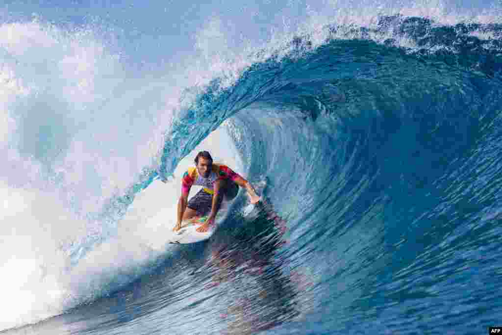 Portuguese surfer Frederico Morais competes on the second day of the 2019 Tahiti Pro at Teahupoo, Tahiti, Aug. 25, 2019.