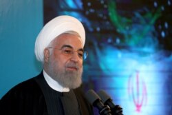 In this photo released by the official website of the office of the Iranian Presidency, President Hassan Rouhani speaks in Iran, Feb. 25, 2020.