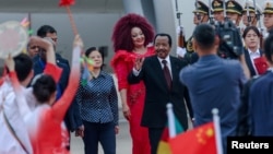 FILE - Cameroon's President Paul Biya, center, waves as he arrives at the Beijing Capital International Airport, ahead of the 2024 Summit of the Forum on China-Africa Cooperation (FOCAC) in Beijing, China, Sept. 4, 2024. 