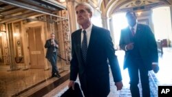 Special Counsel Robert Mueller departs after a closed-door meeting with members of the Senate Judiciary Committee about Russian meddling in the election and possible connection to the Trump campaign, at the Capitol in Washington, June 21, 2017.