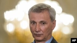 Makhar Vaziev poses as he is presented as the Bolshoi Theater's new ballet director in Moscow, Russia, Monday, Oct. 26, 2015.