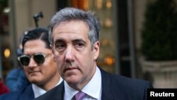 Michael Cohen akiondoka nyumbani kwenda kutoa ushahidi katika kesi ya jinai ya mgombea urais wa chama cha Republican na rais wa zamani wa Marekani Donald Trump mjini New York.