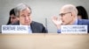 UN Secretary-General Antonio Guterres (L) and UN High Commissioner for Human Rights Volker Turk talk as they arrive for the opening of 55th session of the Human Rights Council in Geneva on February 26, 2024. (Photo by GABRIEL MONNET / AFP)