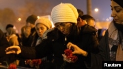 People gather to mark the two-year anniversary of the devastating earthquake as they remember lost family and friends, in Hatay, Turkey, Feb. 6, 2025. 