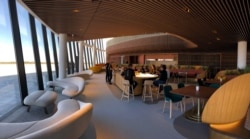 Virgin Galactic employees gather at the coffee bar that serves as the heart of the company's social hub at Spaceport America near Upham, New Mexico, Aug. 15, 2019.