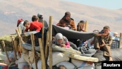Dân Syria chạy tránh các trận giao tranh