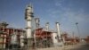 FILE - This March 16, 2019 file photo, shows a natural gas refinery at the South Pars gas field on the northern coast of the Persian Gulf, in Asaluyeh, Iran. China's state oil company has pulled out of a $5 billion deal to develop a portion of Iran…