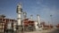 FILE - This March 16, 2019 file photo, shows a natural gas refinery at the South Pars gas field on the northern coast of the Persian Gulf, in Asaluyeh, Iran. China's state oil company has pulled out of a $5 billion deal to develop a portion of Iran…