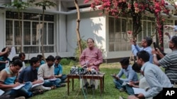 Bangladesh Bank Governor Atiur Rahman, center, addresses a press conference in Dhaka, Bangladesh, Tuesday, March 15, 2016.