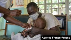 A child gets a malaria vaccination in Yala, Kenya, on Oct. 7, 2021.