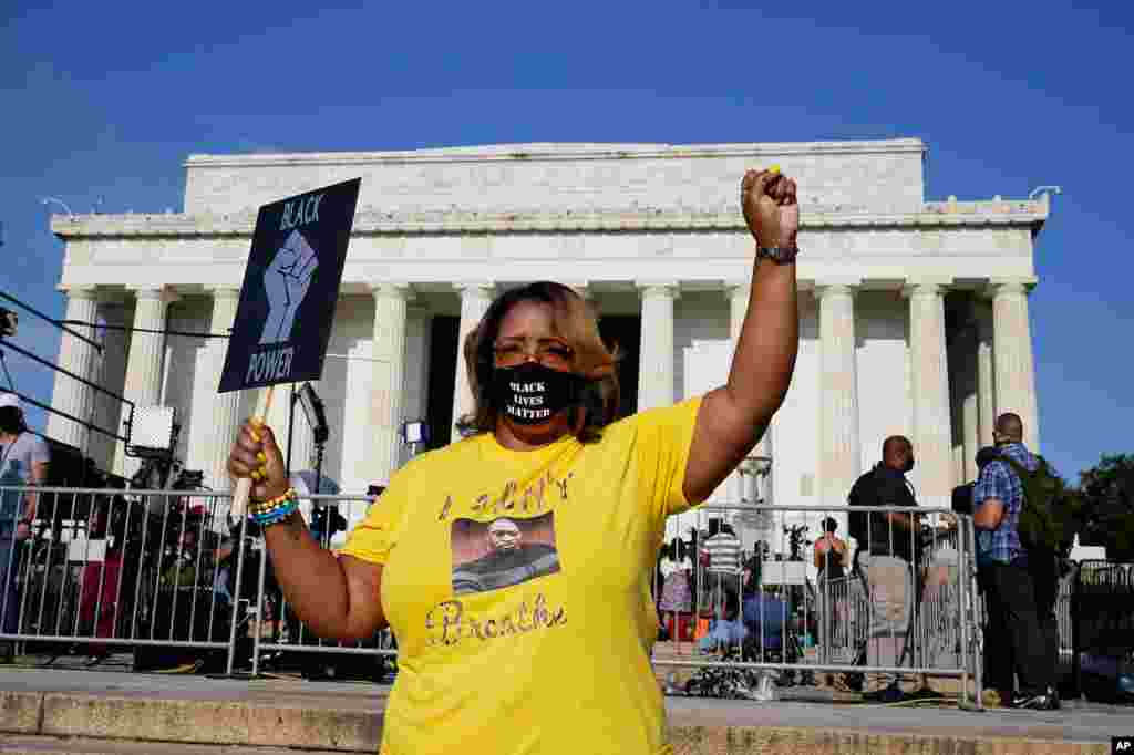 Shontina Kuykendoll of Dallas, attends the March on Washington, Aug. 28, 2020, at the Lincoln Memorial in Washington.