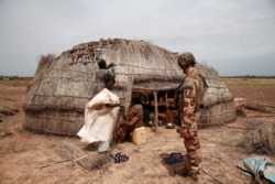 A French soldier of the 2nd Foreign Engineer Regiment conducts an area control operation in the Gourma region during Operation Barkhane in Ndaki, Mali, July 28, 2019.