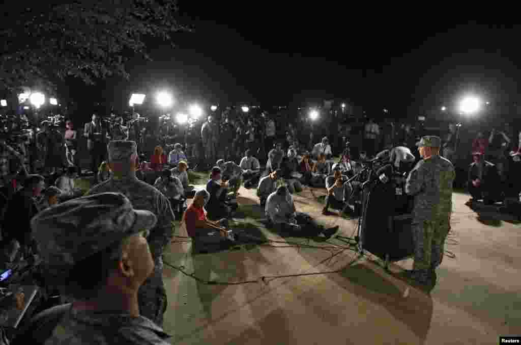 Lt. Gen. Mark Milley addresses the media during a news conference at the entrance to Fort Hood Army Post in Texas, April 2, 2014. 