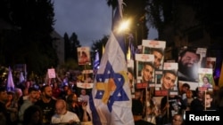 Protesters march towards Israeli Prime Minister Benjamin Netanyahu's private residence, to mark one year since the deadly October 7 attack by Hamas, in Jerusalem, October 7, 2024.