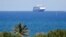 FILE - Carnaval's Holland America cruise ship Zaandam approaches Port Everglades during the new coronavirus pandemic, April 2, 2020, in Fort Lauderdale, Fla. 
