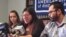 FILE - Lilian Calderon, center, cries as she describes her experiences while in custody, alongside her husband, Luis Gordillo, right, during a news conference at the office of the American Civil Liberties Union in Providence, R.I., Feb. 14, 2018. Calderon was detained by Immigration and Customs Enforcement after an interview designed to confirm her marital relationship.
