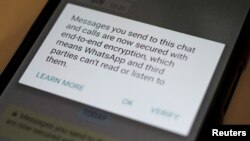 A security update message is seen on a Whatsapp message, April 6, 2016. 