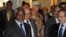 Syria's Deputy Foreign Minister Faisal al-Miqdad (R) welcomes U.N.-Arab League envoy Kofi Annan at a hotel in Damascus, July 8, 2012.