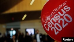 FILE - Balloons decorate an event for community activists and local government leaders to mark the one-year-out launch of the 2020 Census efforts in Boston, Massachusetts, April 1, 2019.