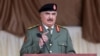 FILE PHOTO: Libyan military commander Khalifa Haftar gestures as he speaks during Independence Day celebrations in Benghazi