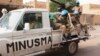 Les Casques bleus de l'ONU du Burkina Faso patrouillent le jour des élections à Tombouctou le 28 juillet 2013. (REUTERS/Joe Penney).