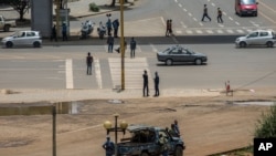 Security forces stand guard in Meskel Square in central Addis Ababa, June 23, 2019. 