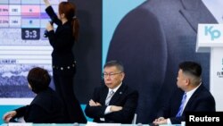 Taiwan People’s Party Chairman Ko Wen-je reacts during a press event with the media in Taipei