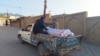 Relatives transport the body of a victim of a gunmen firing incident in Parachinar, main town of Kurram district of Pakistan's northwestern Khyber Pakhtunkhwa province, Nov. 22, 2024. 