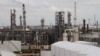 FILE - An oil refinery and storage facility is pictured south of downtown Houston, Jan. 30, 2012.