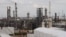 FILE - An oil refinery and storage facility is pictured south of downtown Houston, Jan. 30, 2012.