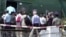 FILE - In this image made from video, U.N. Security Council ambassadors board a helicopter to fly to Maungdaw district of Rakhine State, in Sittwe, Myanmar, Tuesday, May 1, 2018. 