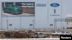 Vehicles speed past Ford's Oakville Assembly Plant as trade tensions escalate over U.S. tariffs and retaliatory measures by Canada, Oakville, Ontario, Canada, Feb. 2, 2025. 