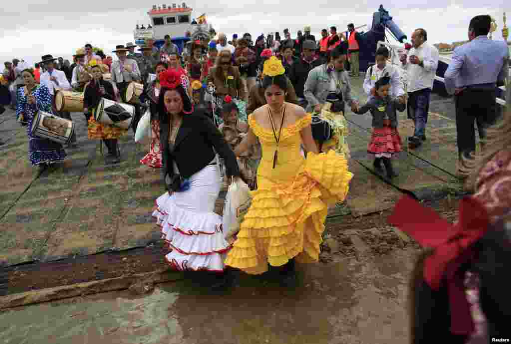 Pilgrims on their way to the shrine of El Rocio in the Donana National Park, southern Spain. Every spring, hundreds of thousands of devotees converge at a shrine to pay homage to the Virgin del Rocio during an annual pilgrimage.