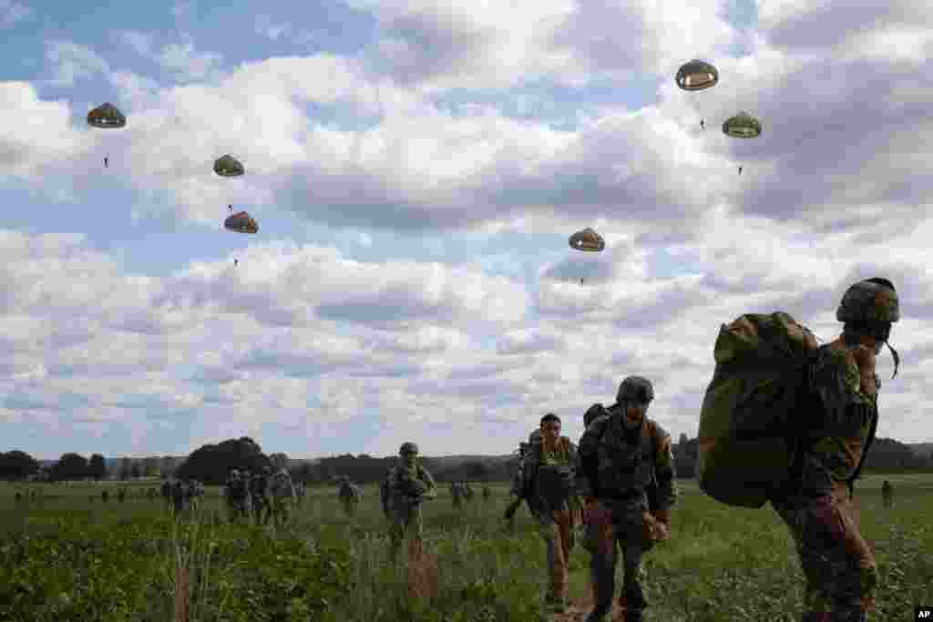 Parachutists jump from a plane near Groesbeek, Netherlands to mark the 75th anniversary of Operation Market Garden, an ultimately unsuccessful airborne and land offensive that Allied leaders hoped would bring a swift end to World War II.