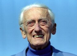 FILE - Captain Jacques Yves Cousteau poses on the French Riviera, April 9, 1995.