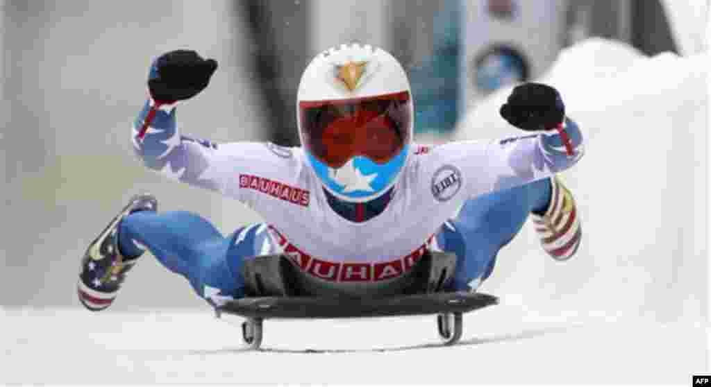 USA's Katie Uhlaender reacts after winning the women's Skeleton World Championships in Lake Placid, N.Y., on Friday, Feb. 24, 2012. (AP Photo/Mike Groll)