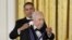 U.S. President Barack Obama presents the Presidential Medal of Freedom to Israeli President Shimon Peres in the East Room of the White House in Washington, June 13, 2012.