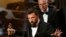 Director and producer Ben Affleck accepts the Oscar for best picture for "Argo" at the 85th Academy Awards in Hollywood, California.