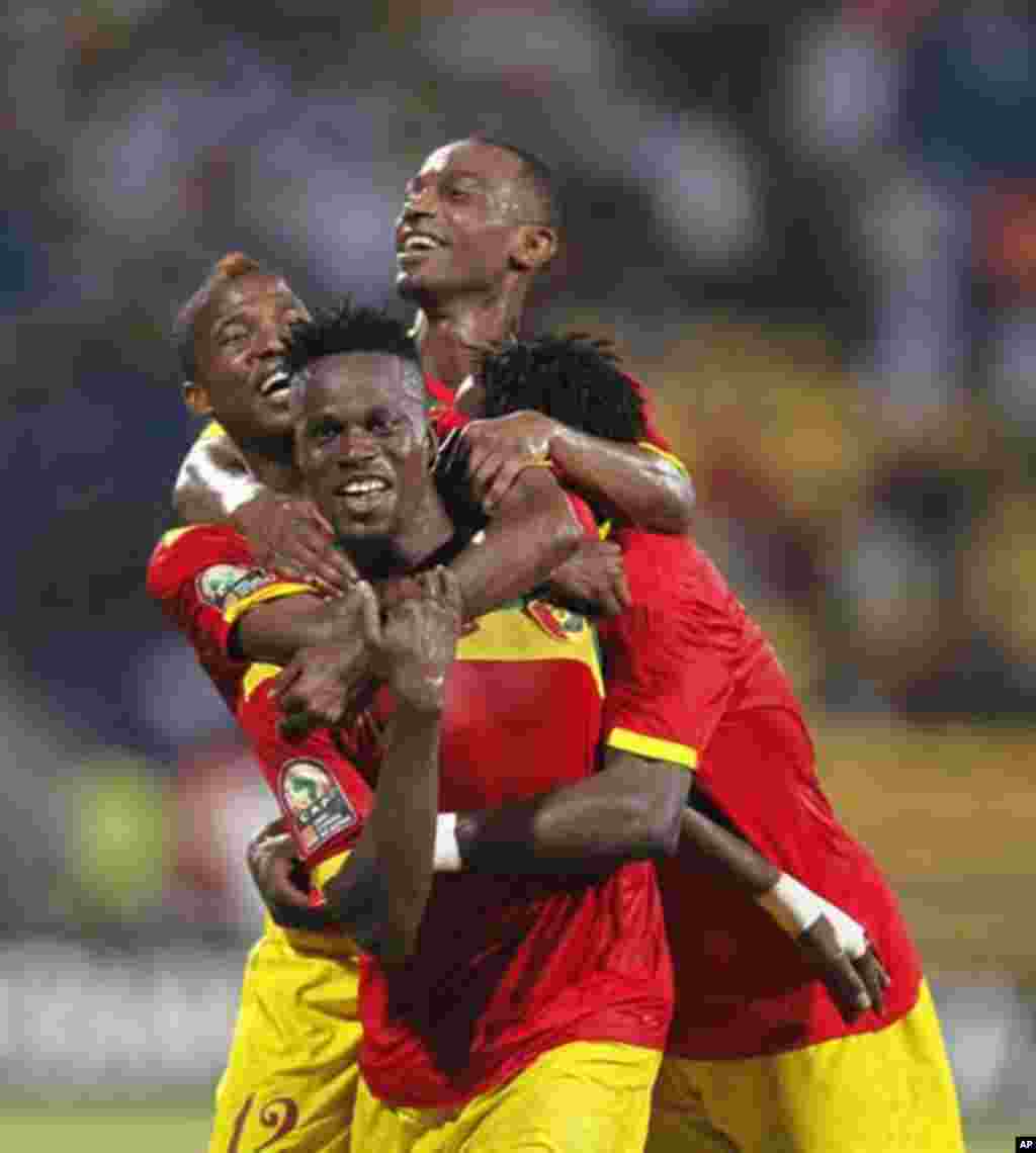 Guinea's Mamadou Dioulde Bah (C) celebrates his goal with teammates during their African Nations Cup Group D soccer match against Botswana at Franceville Stadium January 28, 2012.