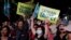 Supporters of the ruling Democratic Progressive Party react during a campaign rally for the local elections, in Taipei, Taiwan, Nov. 21, 2018.